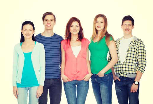 education and people concept - group of smiling students standing