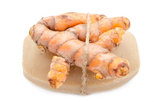 Turmeric, Curcuma Soap on white background.