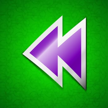 rewind icon sign. Symbol chic colored sticky label on green background. illustration