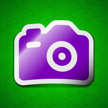 Photo Camera icon sign. Symbol chic colored sticky label on green background. illustration