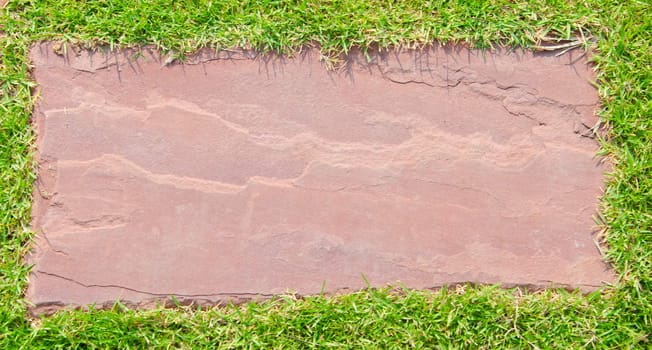 stone walkway on green background