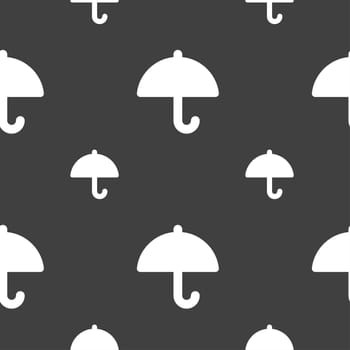 Umbrella icon sign. Seamless pattern on a gray background. illustration