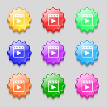 Play video icon sign. symbol on nine wavy colourful buttons. illustration