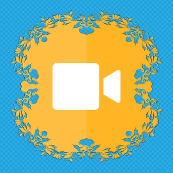 Video camera . Floral flat design on a blue abstract background with place for your text. illustration