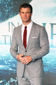 UNITED KINGDOM, London: Australian actor Chris Hemsworth poses for photographers during the premier of In the Heart of the Sea, a Ron Howard movie, in London on December 2nd, 2015.