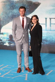 UNITED KINGDOM, London: Australian actor Chris Hemsworth and British actress Charlotte Riley pose for photographers during the premier of In the Heart of the Sea, a Ron Howard movie, in London on December 2nd, 2015.