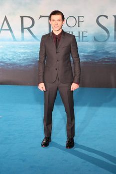 UNITED KINGDOM, London: British actor Tom Holland poses for photographers during the premier of In the Heart of the Sea, a Ron Howard movie, in London on December 2nd, 2015.