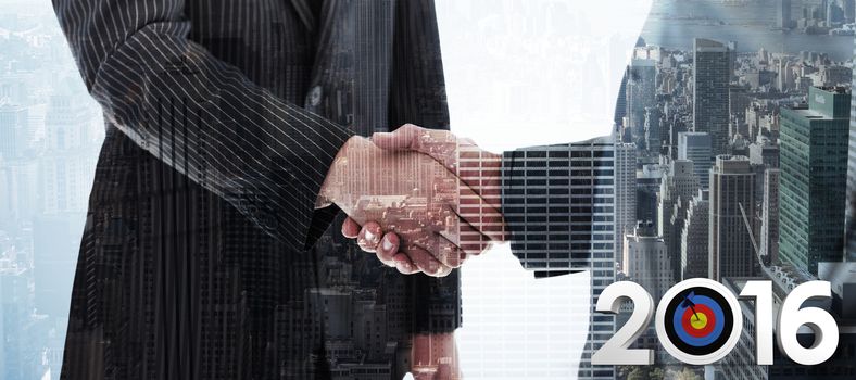 2016 graphic against composite image of business people shaking hands