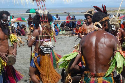 Traditional tribal dance at mask festival.
7th Gulf Mask Festival, Toare Village, Gulf Province, Papua New Guinea on June 19, 2011