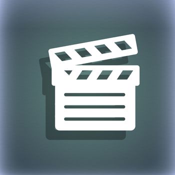 Cinema Clapper icon symbol on the blue-green abstract background with shadow and space for your text. illustration