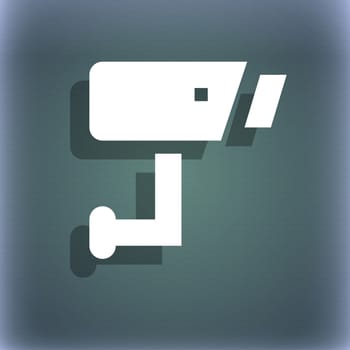 Surveillance Camera icon symbol on the blue-green abstract background with shadow and space for your text. illustration