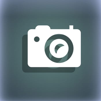 Digital photo camera icon symbol on the blue-green abstract background with shadow and space for your text. illustration