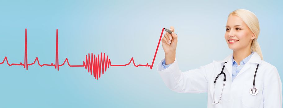 healthcare, medical and technology concept - young female doctor drawing heartbeat cardiogram in the air over blue background