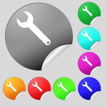 Wrench key sign icon. Service tool symbol. Set of eight multi colored round buttons, stickers. illustration
