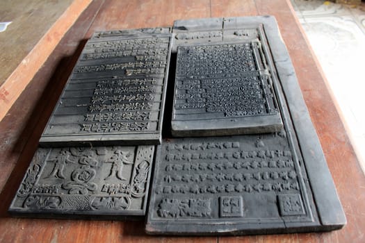 Buddhist scripture by wood