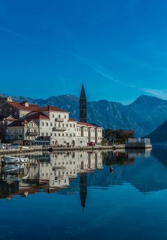 Beautiful Old town Perast in Montenegro, sea reflection 