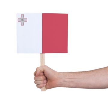 Hand holding small card, isolated on white - Flag of Malta