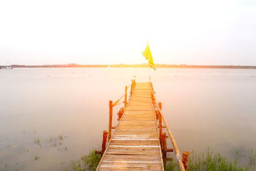wooden road leading to the river