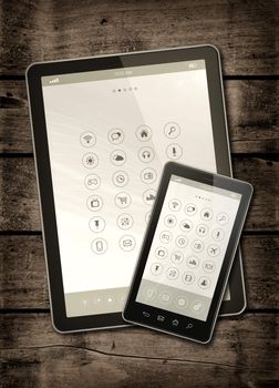 Smartphone and digital tablet PC with desktop icons on a dark wood table - vertical office mockup