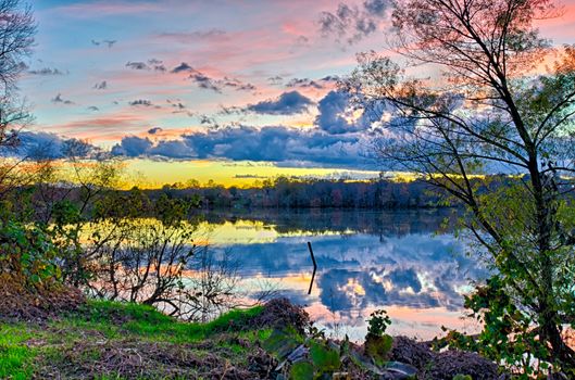 sunset and reflection with beautiful sky rainbow colors