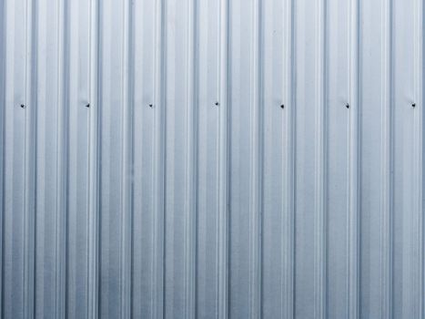 This is the corrugated iron wall of factory . Use for background