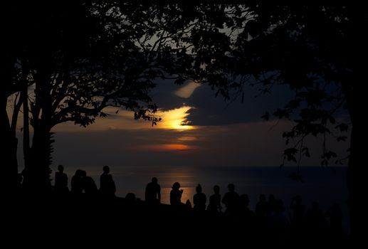 People at sunset by the sea in Thailand.






Sunset on the sea in Thailand with a silhouette of a person.