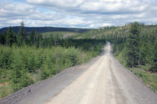 Gravel road Kolyma state highway outback, Russia