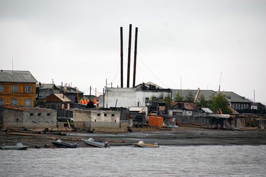 Chimney of boiler station at Kolyma river town, Yakutia, Russia