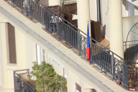 Balcony with French Flag in Nice, France