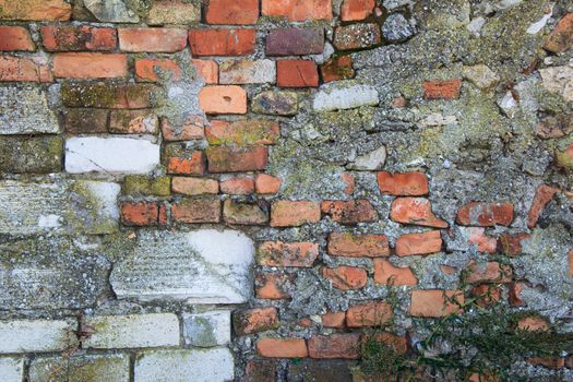 old stone fence falling apart  big background 