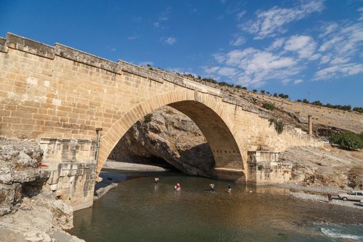 ADIYAMAN, TURKEY - AUGUST 24, 2015 : View of ancient historical Cendere Bridge, built in about 200 AC for Roma Imperiur Septimus Severus in Adiyaman.