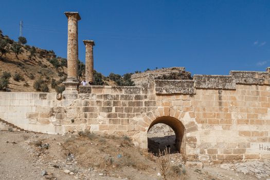 ADIYAMAN, TURKEY - AUGUST 24, 2015 : View of ancient historical Cendere Bridge, built in about 200 AC for Roma Imperiur Septimus Severus in Adiyaman.