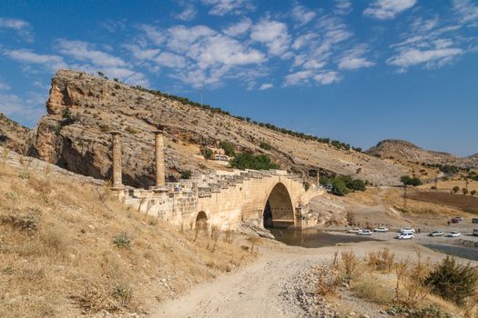 ADIYAMAN, TURKEY - AUGUST 24, 2015 : View of ancient historical Cendere Bridge, built in about 200 AC for Roma Imperiur Septimus Severus in Adiyaman.