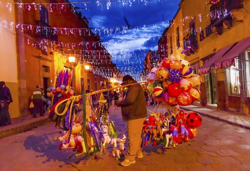 Balloon Seller Night Lights Shops Nightlife San Miguel de Allende, Mexico. 