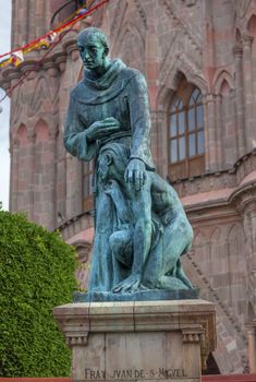 Father Juan de San Miiguel Statue Facade Parroquia Christmas Archangel church San Miguel de Allende, Mexico. Parroaguia created in 1600s and facade created in 1880s.

