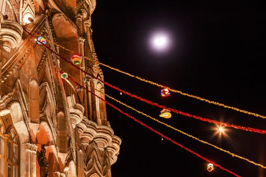 Facade Night Moon Parroquia Christmas Archangel church San Miguel de Allende, Mexico. Parroaguia created in 1600s and facade created in 1880s.

