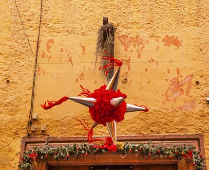 Red Star Piinata Chrismas Decoration Jardin Town Tree Square San Miguel de Allende Mexico. 