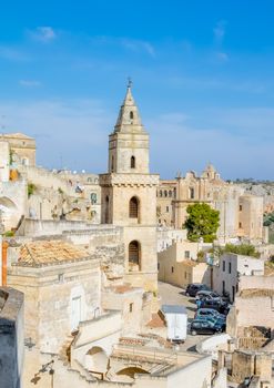 panoramic view of typical church of Matera UNESCO European Capital of Culture 2019 under blue sky. Basilicata, Italy