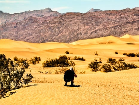 a man taking photo of the Death Valley national park,USA