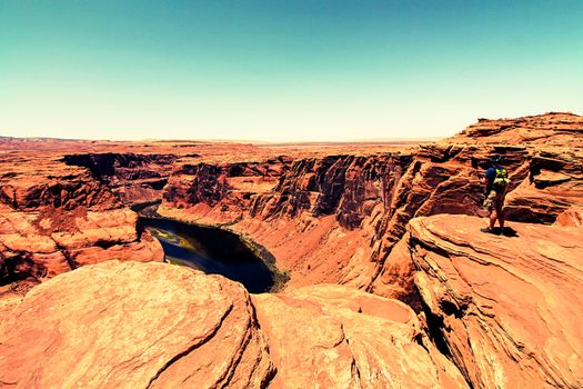 people enjoy the view of  the Horseshoe Bend,USA