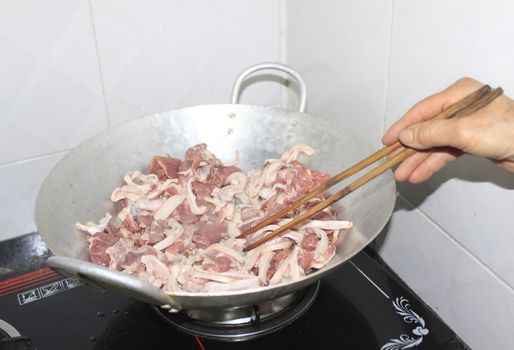 woman make spring rolls 