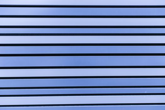 Blue metal bars in symmetry as a background







The blue bars