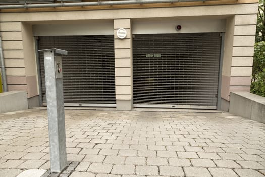 An entrance to a secure parking garage