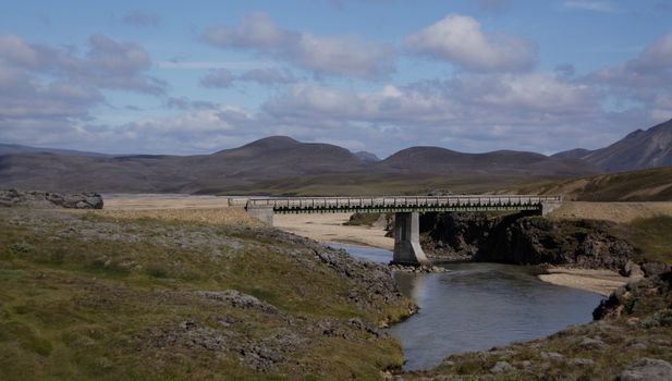 Landscape with old  volcano,river and bridge in Iceland 