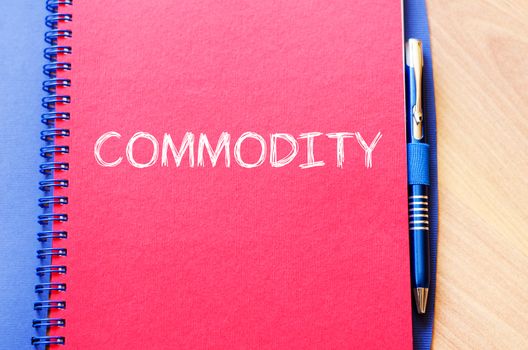 Commodity text concept write on notebook with pen