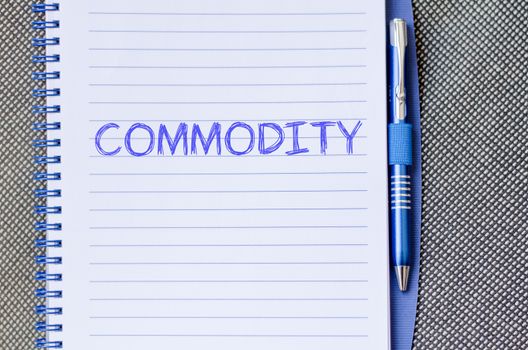 Commodity text concept write on notebook with pen