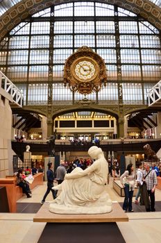 Paris, France - May 14, 2015: Visitors in the Musee d'Orsay in Paris, France. on May 14, 2015, The museum houses the largest collection of impressionist and post-impressionist masterpieces in the world.