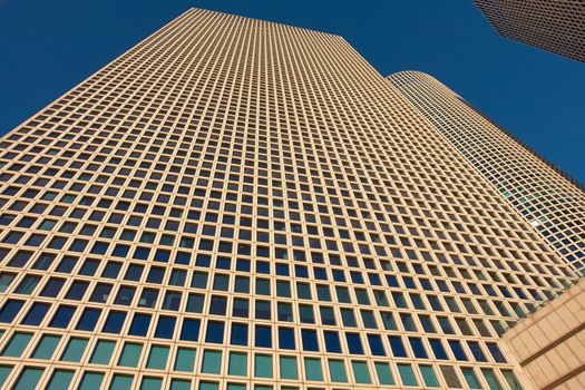 Modern urban city landscape of skyscrapers with clear blue sky background                          