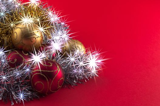 Christmas decoration, red gold and silver, on red background