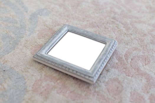 Close up detailed top view of white blank wooden frame with copy space.